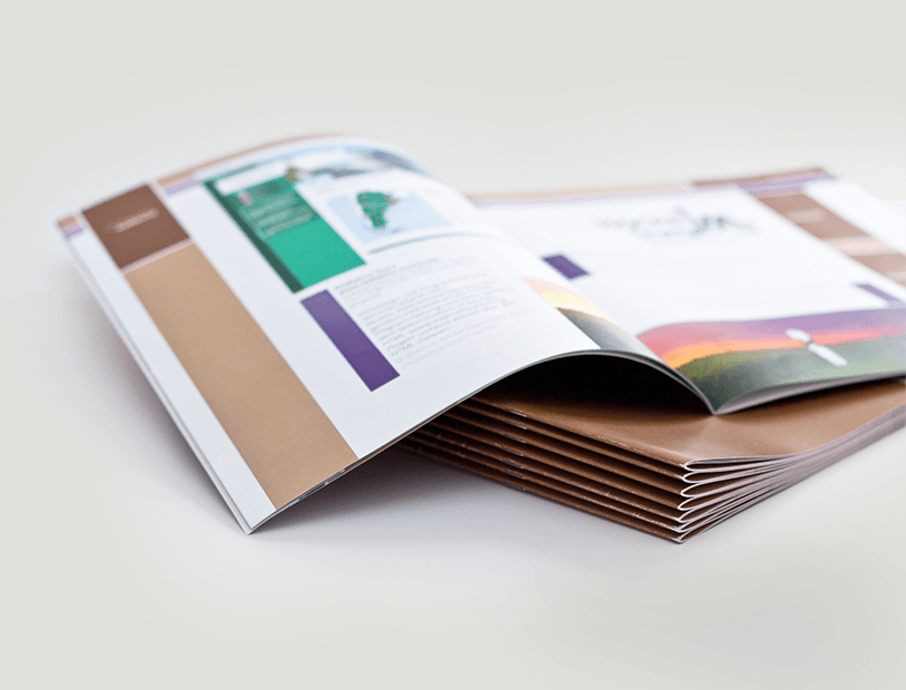 Stacked booklet with colorful pages designed by black label branding